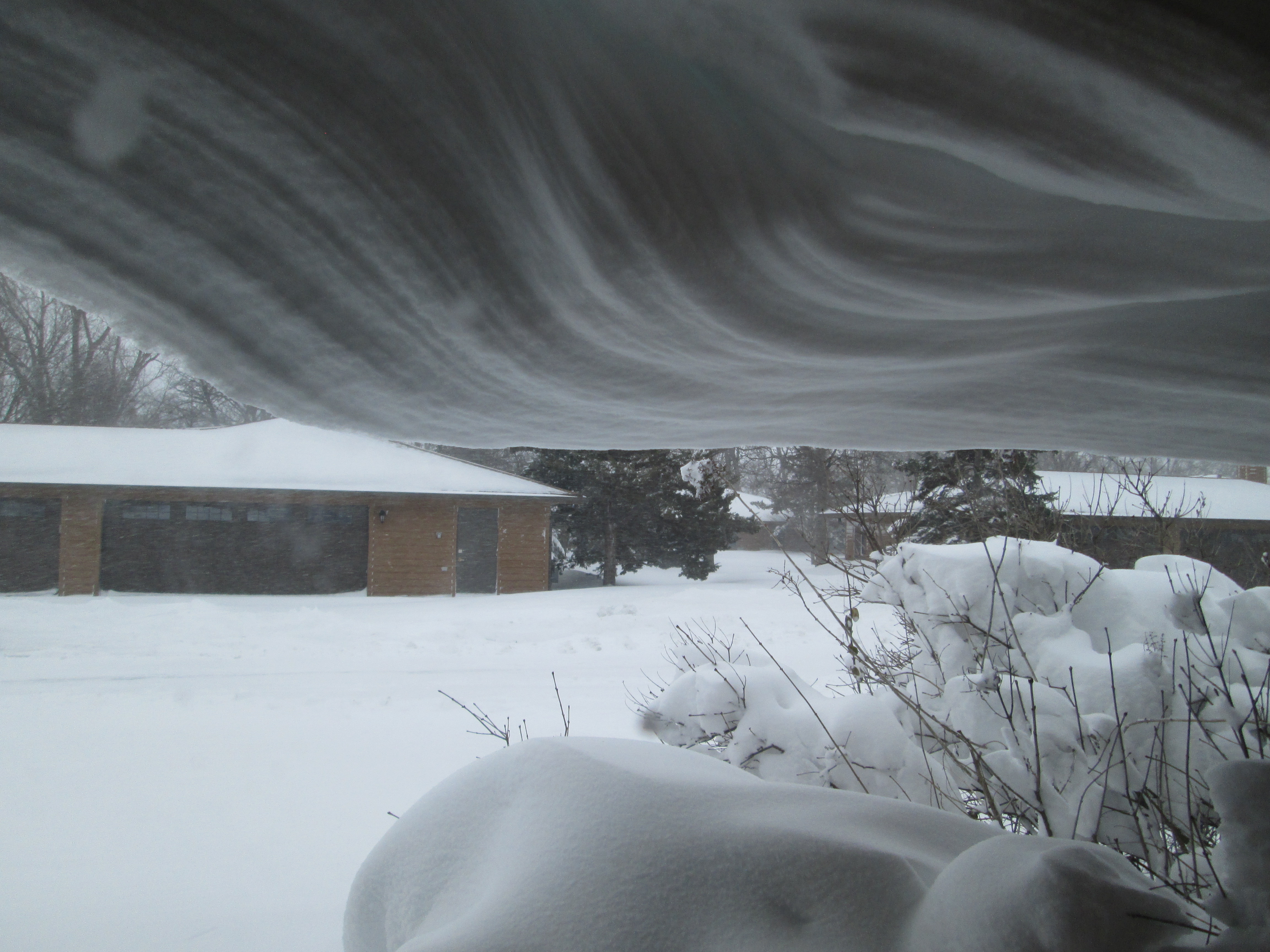 Snow Drift Hanging from Roof